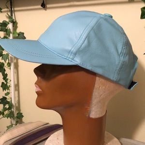 Leather HENIG FURS baby blue baseball type hat.